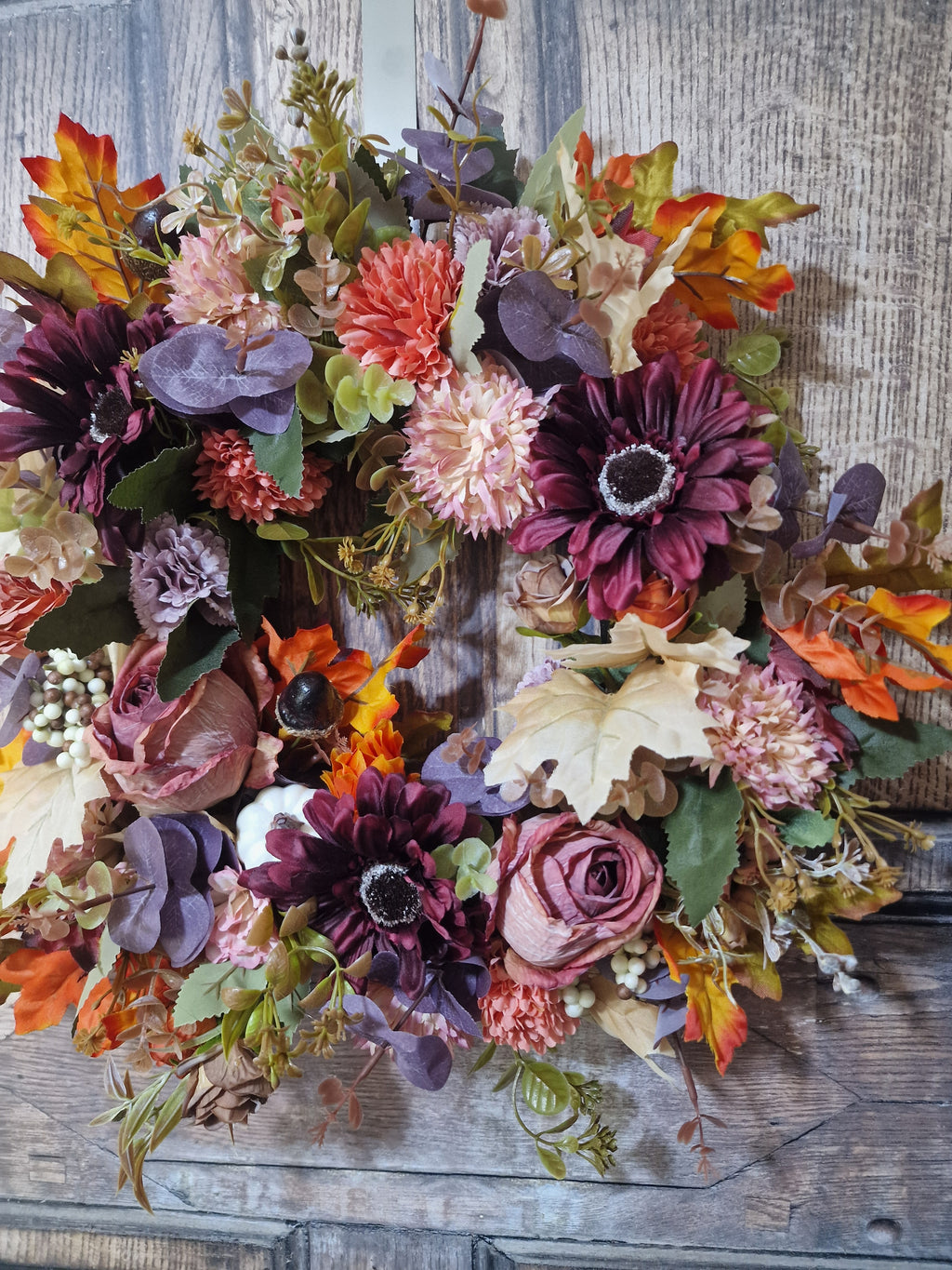 Burgundy Gerbera and Rusts collide